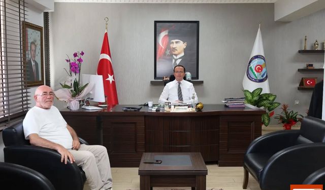 Dinar Kaymakamı Mehmet Naim Akgül, Şehit Babası Mehmet Bayrakçı’yı Makamında Ağırladı